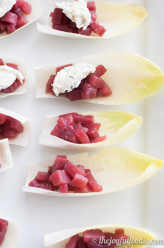 Spiced pears with tangy, herbed goat cheese served over crisp endive - an easy and impressive appetizer or hors d'oeuvre.
