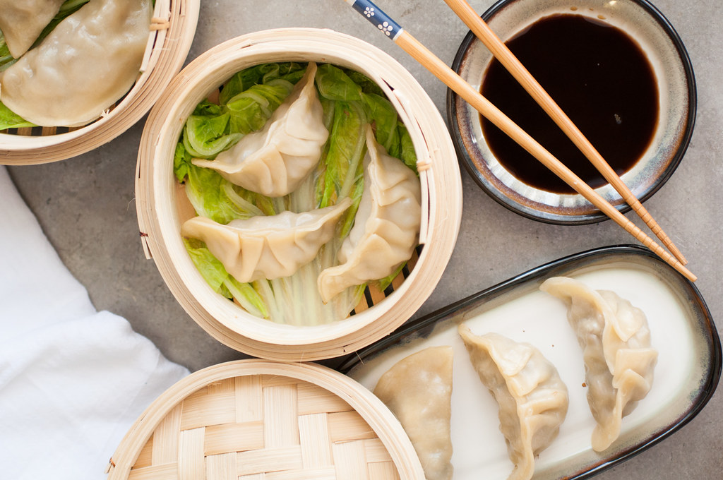 Easy mushroom leek Chinese dumplings. Deliciously savory and vegetarian, too! Step-by-step folding tutorial plus three cooking methods!